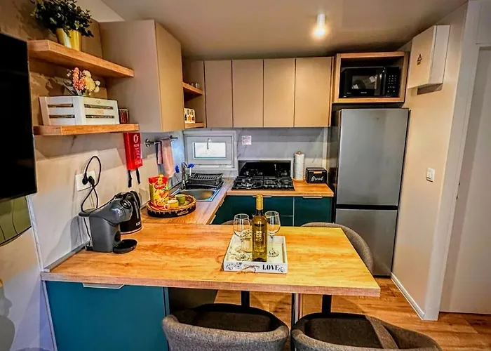 Mobile Tasha Aldeamento Turístico